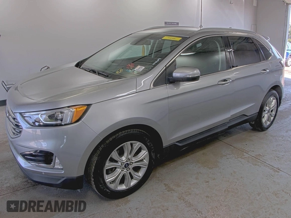 2020 Ford Edge Titanium z VIN 2FMPK4K91LBA91290, wystawiony jako IAAI lot #42494043 z przebiegiem 71 254 mil mil oraz . Historia ofert i sprzedaży dostępna na DreamBid. Obrazek 14.
