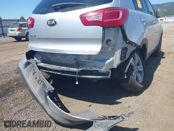 2013 Kia Sportage LX with VIN KNDPBCA24D7352828, listed as a IAAI auction lot 42685744 with 156,805 mi miles and . Bid and sale history available at DreamBid. Image 6.