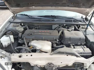 2004 Toyota Camry LE with VIN 4T1BE32K84U374943, listed as a IAAI auction lot 42038382 with 323,419 mi miles. Bid and sale history available at carsss.com. Image 10.