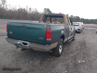 1999 Ford F-150 Work Series with VIN 1FTRX17W1XNB99012, listed as a IAAI auction lot 41412216 with 1 mi miles. Bid and sale history available at carsss.com. Image 4.