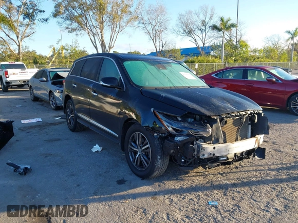 2019 Infiniti QX60 LUXE with VIN 5N1DL0MN0KC548592, listed as a IAAI auction lot 41305876 with 142,064 mi miles. Bid and sale history available at carsss.com. Image 1.
