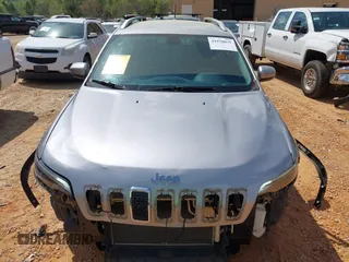 2019 Jeep Cherokee Latitude with VIN 1C4PJLCX7KD220799, listed as a IAAI auction lot 41970875 with 104,394 mi miles and . Bid and sale history available at DreamBid. Image 12.