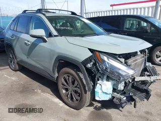 2023 Toyota RAV4 Hybrid XLE Premium with VIN JTMB6RFV8PD086983, listed as a IAAI auction lot 41612674 with 70,817 mi miles. Bid and sale history available at carsss.com. Image 1.