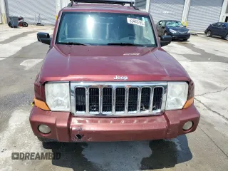 2007 Jeep Commander Sport z VIN 1J8HG48K27C527423, wystawiony jako Copart lot #63448765 z przebiegiem 212 856 mil mil oraz Szkoda całkowita • Salvage title. Historia ofert i sprzedaży dostępna na DreamBid. Obrazek 5.