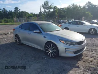 2016 Kia Optima LX with VIN 5XXGT4L30GG065152, listed as a IAAI auction lot 42556909 with 161,798 mi miles and . Bid and sale history available at DreamBid. Image 1.