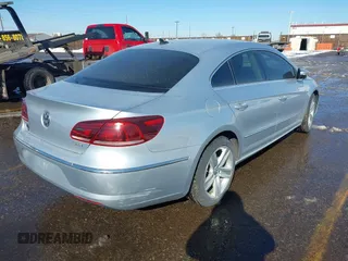 2014 Volkswagen CC Sport with VIN WVWBP7AN5EE508465, listed as a IAAI auction lot 41403844 with 97,445 mi miles and . Bid and sale history available at DreamBid. Image 4.