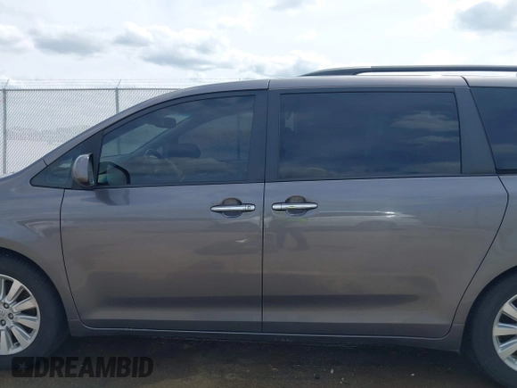 2011 Toyota Sienna XLE AAS with VIN 5TDYK3DC1BS069668, listed as a IAAI auction lot 42055430 with 212,167 mi miles and . Bid and sale history available at DreamBid. Image 15.