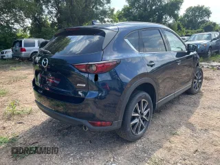 2018 Mazda CX-5 Grand Touring with VIN JM3KFBDMXJ1391984, listed as a Copart auction lot 65138665 with 97,244 mi miles and Clean title. Bid and sale history available at DreamBid. Image 4.