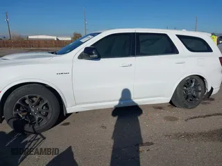 2021 Dodge Durango R/T with VIN 1C4SDJCT4MC663939, listed as a IAAI auction lot 40950558 with 52,054 mi miles and . Bid and sale history available at DreamBid. Image 14.