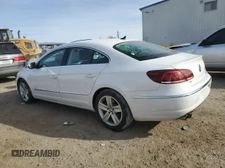 2014 Volkswagen CC R-Line with VIN WVWBP7AN0EE509782, listed as a Copart auction lot 87114074 with 66,204 mi miles and Salvage Title. Bid and sale history available at carsss.com. Image 2.