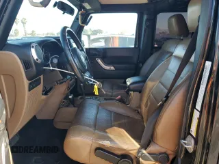 2012 Jeep Wrangler Unlimited Rubicon with VIN 1C4HJWFG9CL276753, listed as a Copart auction lot 62996995 with 234,159 mi miles and Clean title. Bid and sale history available at DreamBid. Image 7.