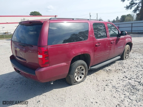 2007 Chevrolet Suburban LT with VIN 1GNFC16J97J355929, listed as a IAAI auction lot 41626223 with 186,644 mi miles. Bid and sale history available at carsss.com. Image 4.