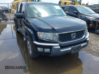2011 Honda Ridgeline RTL with VIN 5FPYK1F54BB011472, listed as a IAAI auction lot 42112512 with 194,974 mi miles and . Bid and sale history available at DreamBid. Image 1.
