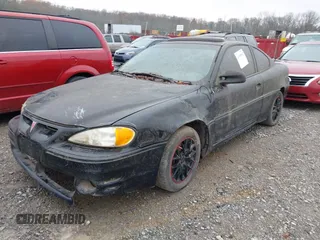2000 Pontiac Grand Am GT with VIN 1G2NW12E2YM744579, listed as a IAAI auction lot 41098582 with 186,205 mi miles. Bid and sale history available at carsss.com. Image 2.