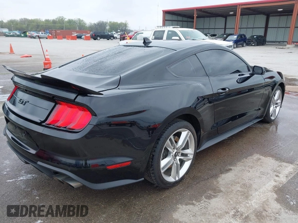 2021 Ford Mustang GT z VIN 1FA6P8CF2M5149643, wystawiony jako IAAI lot #41981794 z przebiegiem 57 345 mil mil oraz . Historia ofert i sprzedaży dostępna na DreamBid. Obrazek 4.