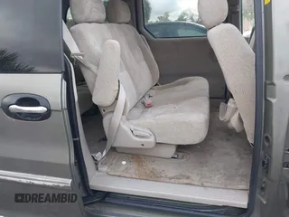 2004 Kia Sedona LX with VIN KNDUP131346533373, listed as a IAAI auction lot 41632342 with 76,545 mi miles. Bid and sale history available at carsss.com. Image 8.