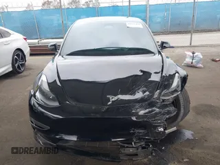 2023 Tesla Model 3 with VIN 5YJ3E1EA7PF473749, listed as a IAAI auction lot 41921478 with 21,483 mi miles and . Bid and sale history available at DreamBid. Image 11.