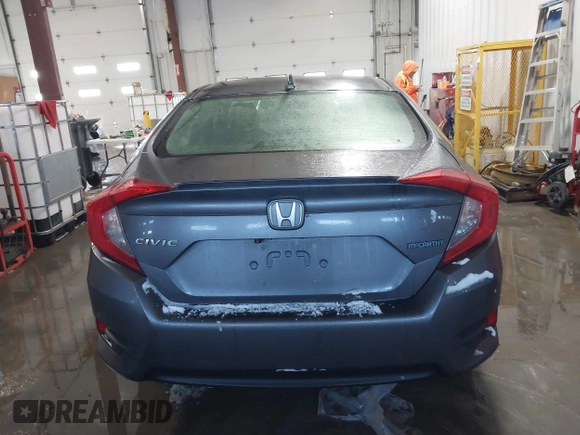 2018 Honda Civic EX-T with VIN JHMFC1F35JX031132, listed as a IAAI auction lot 41591028 with 111,087 mi miles and . Bid and sale history available at DreamBid. Image 16.