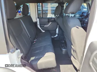 2015 Jeep Wrangler Unlimited Freedom with VIN 1C4HJWDGXFL755528, listed as a Copart auction lot 64927525 with 111,096 mi miles and Salvage title. Bid and sale history available at DreamBid. Image 10.