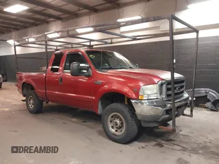 2002 Ford Super Duty F-250 XL with VIN 1FTNX21L82EA87027, listed as a IAAI auction lot 41893004 with 214,580 mi miles. Bid and sale history available at carsss.com. Image 1.