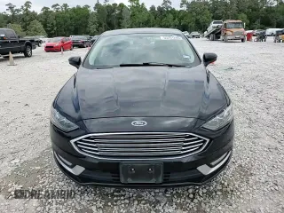 2017 Ford Fusion SE z VIN 3FA6P0H75HR228505, wystawiony jako Copart lot #53251205 z przebiegiem 144 898 mil mil oraz Czysty tytuł • Clean title. Historia ofert i sprzedaży dostępna na DreamBid. Obrazek 14.