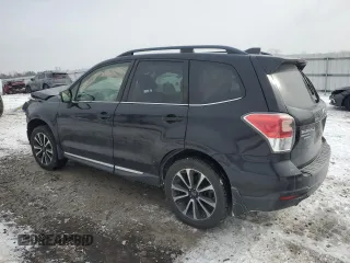 2018 Subaru Forester Touring with VIN JF2SJGWCXJH441073, listed as a Copart auction lot 46008005 with 65,516 mi miles and Salvage Title. Bid and sale history available at carsss.com. Image 2.