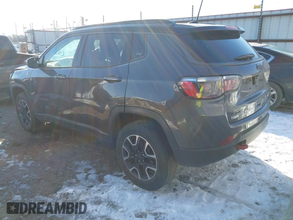 2019 Jeep Compass Trailhawk with VIN 3C4NJDDB3KT602029, listed as a IAAI auction lot 41618243 with 73,088 mi miles and . Bid and sale history available at DreamBid. Image 3.