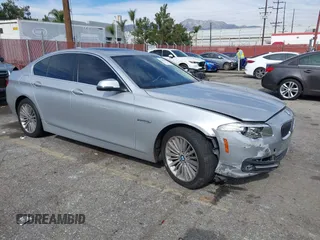 2016 BMW 5 Series 535i with VIN WBA5B1C50GG551122, listed as a IAAI auction lot 41483879 with 96,859 mi miles and . Bid and sale history available at carsss.com. Image 1.