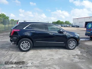 2017 Cadillac XT5 FWD with VIN 1GYKNARS6HZ123114, listed as a IAAI auction lot 41933928 with 166,213 mi miles. Bid and sale history available at carsss.com. Image 13.