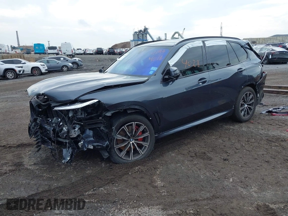 2022 BMW X5 xDrive40i with VIN 5UXCR6C06N9M28108, listed as a IAAI auction lot 41934028 with 28,527 mi miles. Bid and sale history available at carsss.com. Image 2.