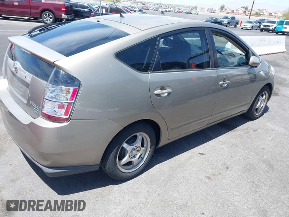 2005 Toyota Prius with VIN JTDKB20U950123255, listed as a IAAI auction lot 42256870 with 226,904 mi miles and . Bid and sale history available at DreamBid. Image 4.
