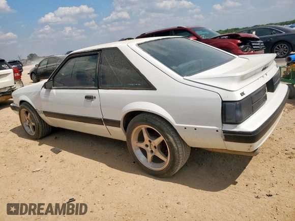 1989 Ford Mustang with VIN 1FABP41E3KF176536, listed as a Copart auction lot 58233075 with 17,202 mi miles and Salvage title. Bid and sale history available at DreamBid. Image 2.