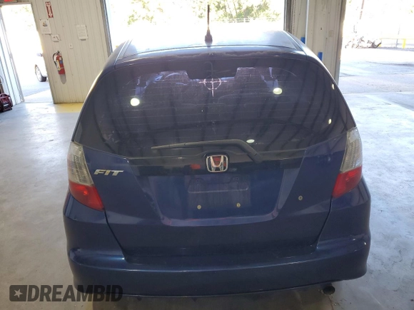 2009 Honda Fit with VIN JHMGE88279S059230, listed as a Copart auction lot 81409304 with 140,991 mi miles and Clean Title. Bid and sale history available at carsss.com. Image 6.