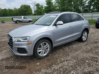 2016 Audi Q3 Premium Plus with VIN WA1EFCFS1GR016996, listed as a Copart auction lot 62118745 with 90,852 mi miles and Salvage title. Bid and sale history available at DreamBid. Image 1.