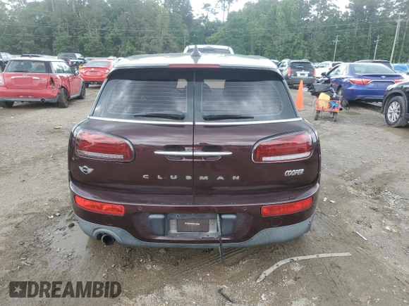 2016 MINI Clubman z VIN WMWLN5C56G2B28065, wystawiony jako Copart lot #54565825 z przebiegiem 129 270 mil mil oraz Szkoda całkowita • Salvage title. Historia ofert i sprzedaży dostępna na DreamBid. Obrazek 6.