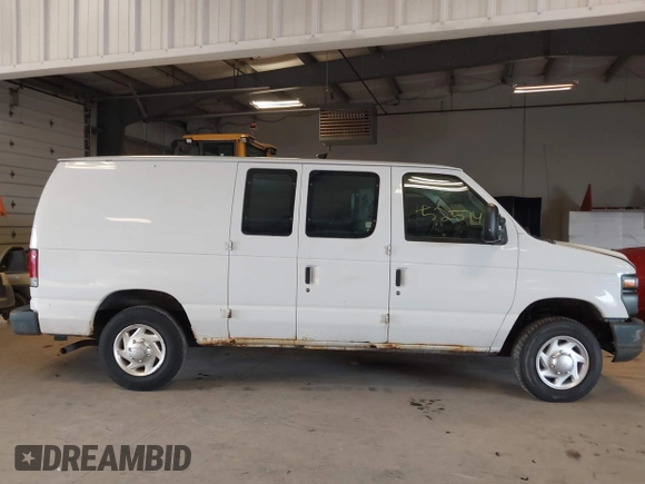 2012 Ford Econoline Cargo Commercial with VIN 1FTNE1EW1CDA97975, listed as a IAAI auction lot 41552574 with 54,665 mi miles and . Bid and sale history available at DreamBid. Image 13.