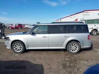 2016 Ford Flex SE z VIN 2FMGK5B8XGBA23900, wystawiony jako IAAI lot #41599714 z przebiegiem 102 961 mil mil oraz . Historia ofert i sprzedaży dostępna na DreamBid. Obrazek 14.