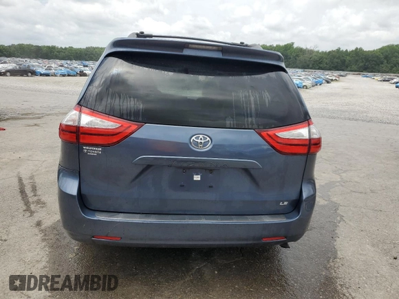 2015 Toyota Sienna LE AAS with VIN 5TDKK3DC5FS596673, listed as a Copart auction lot 61382965 with 176,447 mi miles and Salvage title. Bid and sale history available at DreamBid. Image 6.