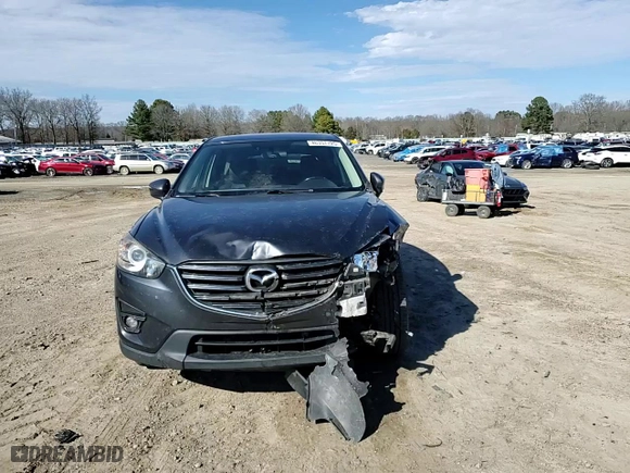 2016 Mazda CX-5 Grand Touring with VIN JM3KE2DY4G0873726, listed as a Copart auction lot 46357725 with 156,658 mi miles and Clean Title. Bid and sale history available at carsss.com. Image 11.