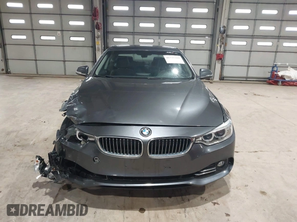 2014 BMW 4 Series 428i xDrive with VIN WBA3N9C56EF721564, listed as a IAAI auction lot 41737409 with 42,052 mi miles and . Bid and sale history available at DreamBid. Image 13.