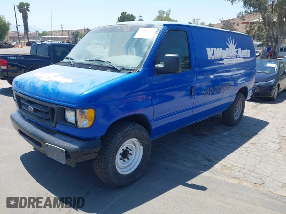 2003 Ford Econoline Cargo with VIN 1FTNE24223HA50404, listed as a IAAI auction lot 42087224 with 210,418 mi miles. Bid and sale history available at carsss.com. Image 2.