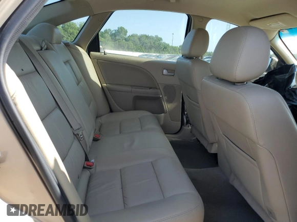 2007 Ford Five Hundred SEL z VIN 1FAFP24117G111409, wystawiony jako Copart lot #61403575 z przebiegiem Nie podano mil oraz Szkoda całkowita • Salvage title. Historia ofert i sprzedaży dostępna na DreamBid. Obrazek 10.