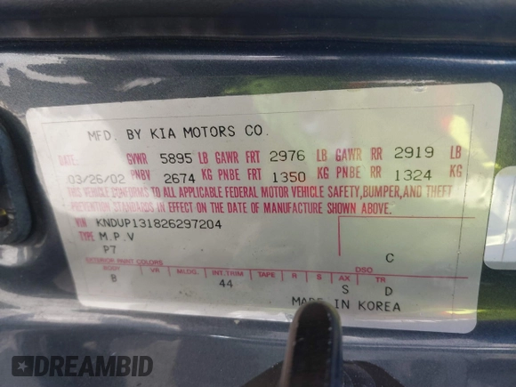 2002 Kia Sedona LX with VIN KNDUP131826297204, listed as a IAAI auction lot 41510393 with 136,337 mi miles. Bid and sale history available at carsss.com. Image 9.