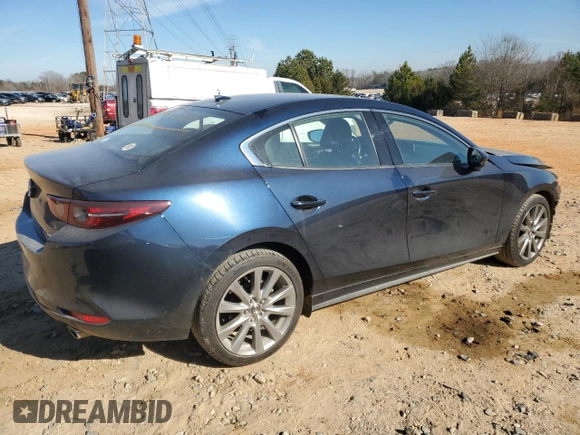 2019 Mazda 3 Premium with VIN 3MZBPAEM2KM104699, listed as a Copart auction lot 86170374 with 59,618 mi miles and Salvage Title. Bid and sale history available at DreamBid. Image 3.