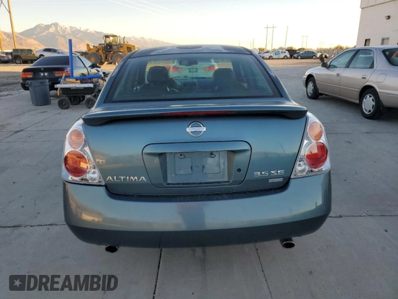 2002 Nissan Altima SE with VIN 1N4BL11E72C201174, listed as a Copart auction lot 79895454 with 164,506 mi miles and Salvage Title. Bid and sale history available at carsss.com. Image 6.