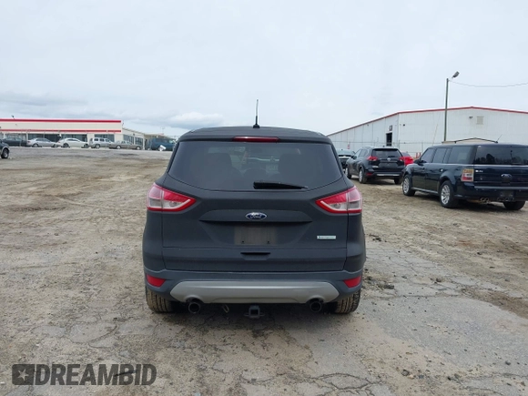 2013 Ford Escape SE with VIN 1FMCU0GX1DUD14948, listed as a IAAI auction lot 41876628 with 277,194 mi miles and . Bid and sale history available at DreamBid. Image 17.