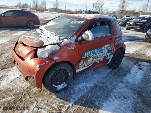 2012 Scion iQ with VIN JTNJJXB02CJ010868, listed as a Copart auction lot 81313514 with 216,297 mi miles and Salvage Title. Bid and sale history available at carsss.com. Image 1.