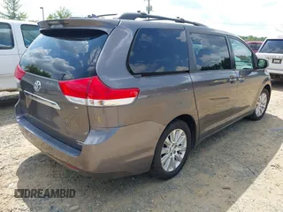2011 Toyota Sienna XLE with VIN 5TDDK3DC2BS001541, listed as a IAAI auction lot 42731870 with 288,853 mi miles and . Bid and sale history available at DreamBid. Image 4.