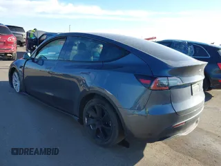 2023 Tesla Model Y Long Range with VIN 7SAYGAEEXPF714760, listed as a IAAI auction lot 41748398 with 49,802 mi miles and . Bid and sale history available at DreamBid. Image 3.