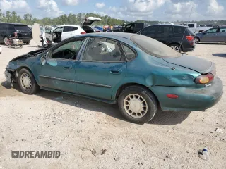 1997 Ford Taurus LX z VIN 1FALP53S1VG316689, wystawiony jako Copart lot #67168694 z przebiegiem 211 414 mil mil oraz Szkody całkowita. Historia ofert i sprzedaży dostępna na DreamBid. Obrazek 2.
